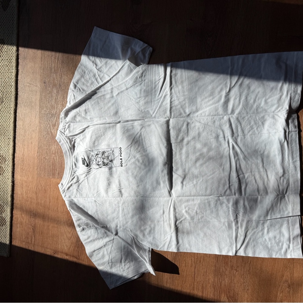 Nike White T-Shirt with Black Line Graphic